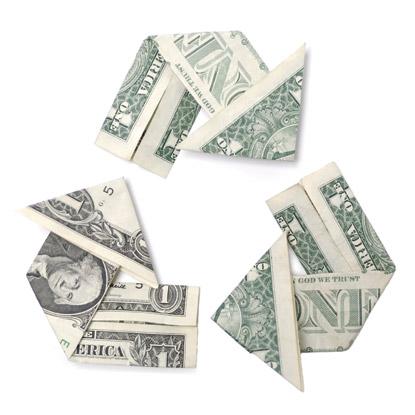 dollar bills in the shape of the recycle triangle