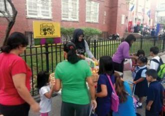 Flatbush Food Co-op’s AppleDay giveaway on the first day of school at neighborin